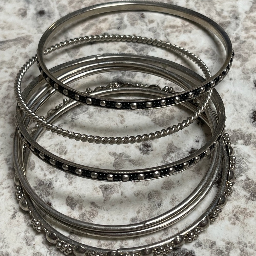 Silver tone hoop earrings and bangles